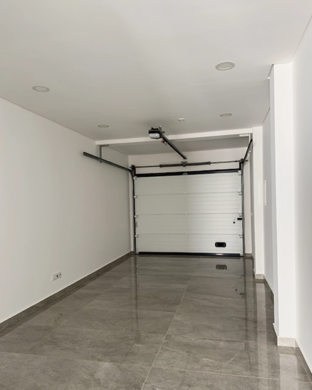 Porte de garage motorisée Paris OFIP Serrurerie